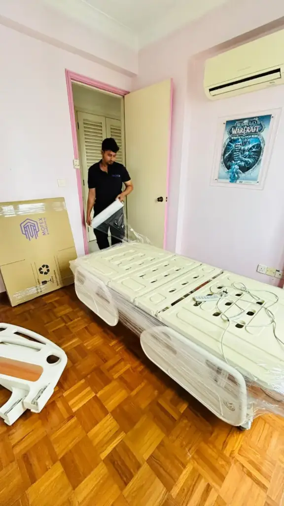 Mofex mover stretch-wrapping an adjustable medical bed